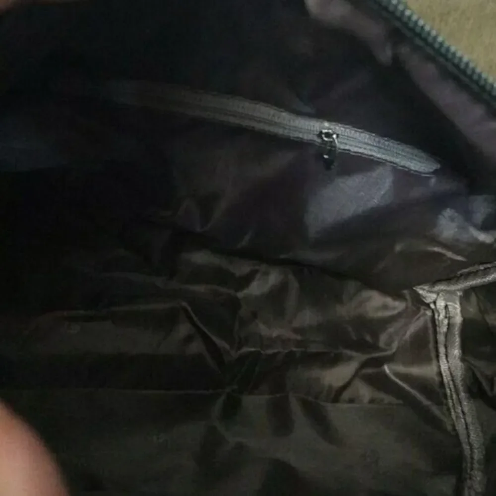 Purse with alternating black and red pattern